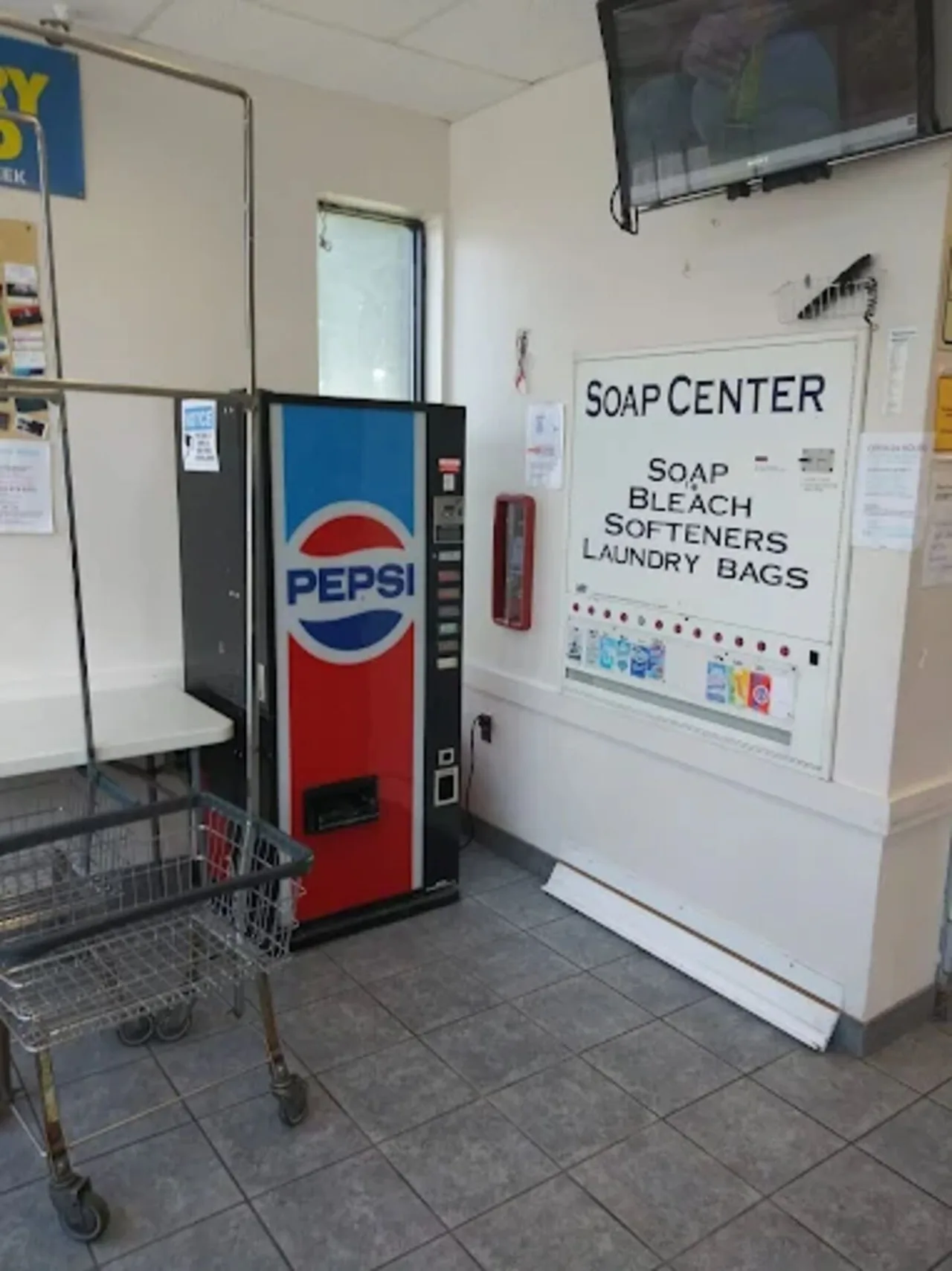 Before renovation: Laundry World soap and vending area